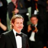 Who calls the tunes in space? Brad Pitt asks NASA astronaut